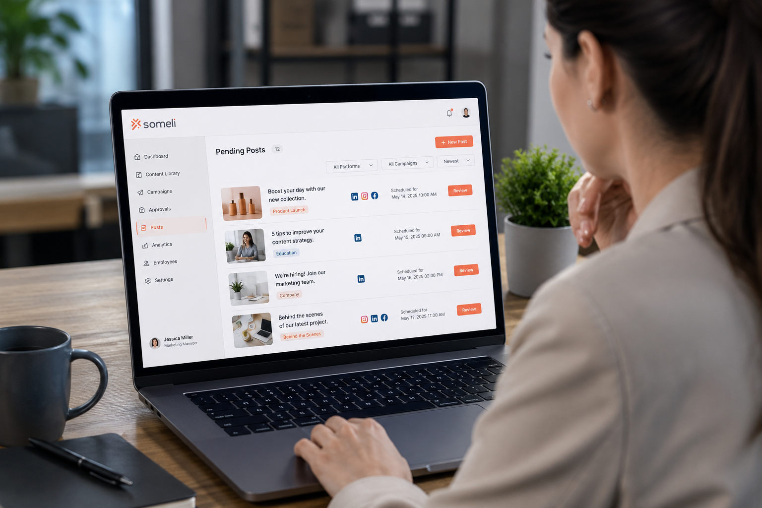 Marketing leader reviewing and approving employee social media posts in Someli dashboard